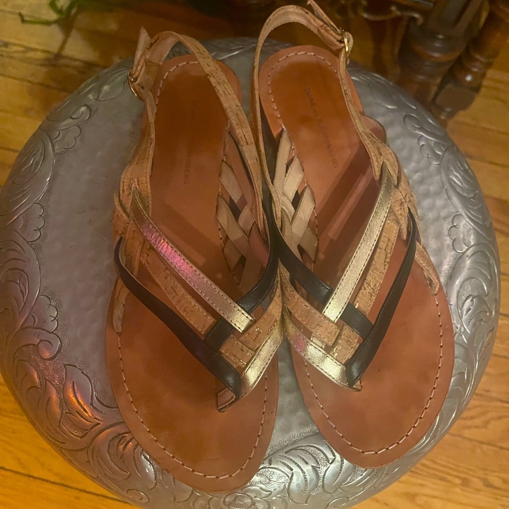Diane von Furstenberg braided leather sandals. In black, cork, and gold leather